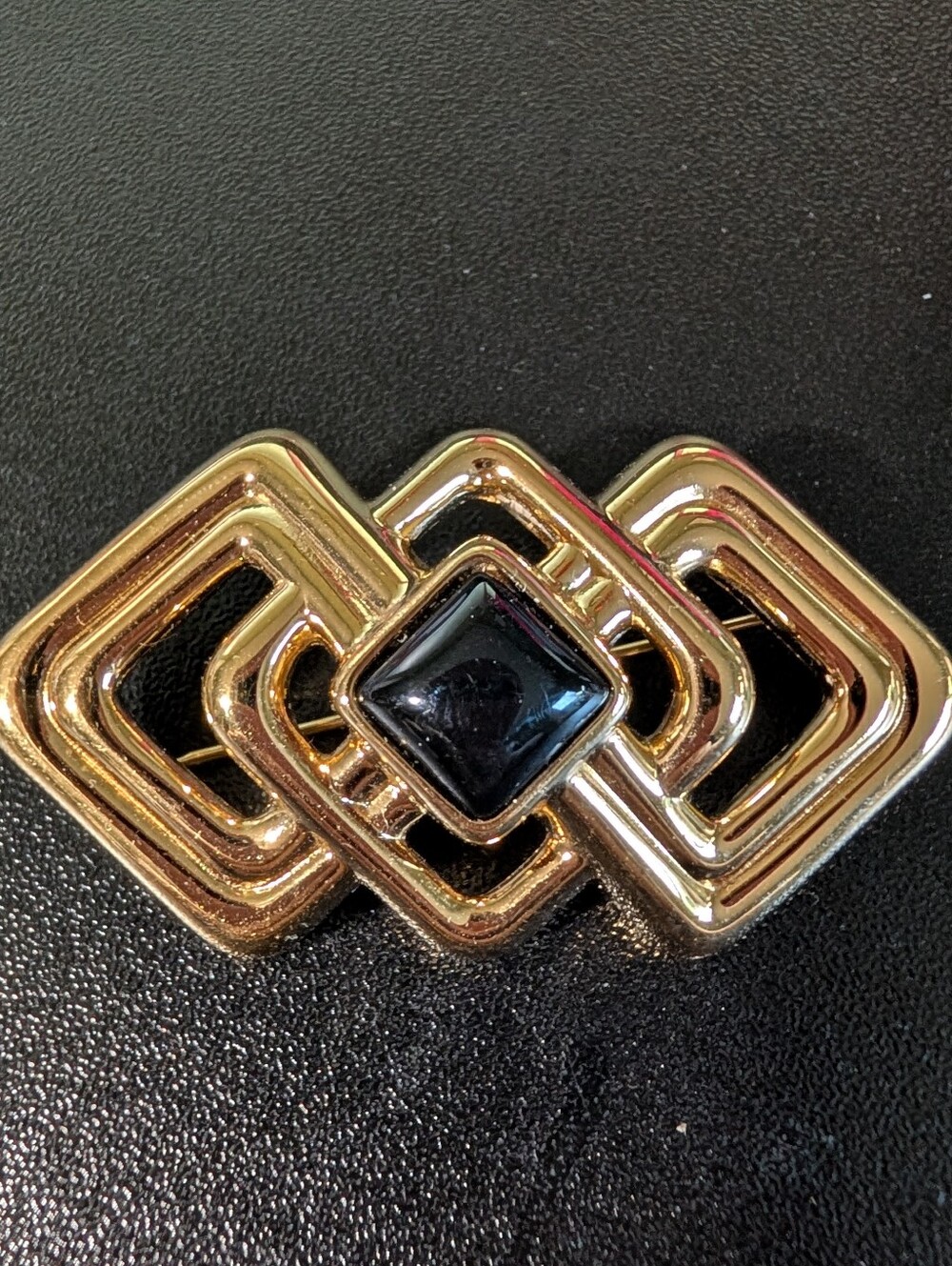 Monet Gold-Tone Interlocking Geometric Belt Accent with Black Center